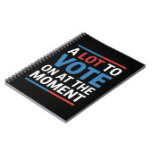 カマラ2024の瞬間に投票するおもしろい多くの ノートブック (左側)