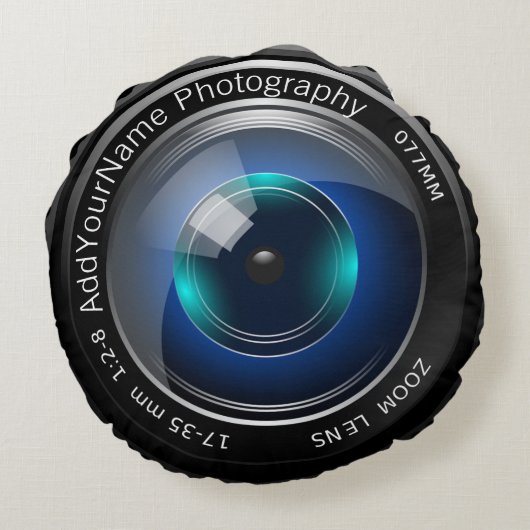 カメラのレンズが自分のレンズを作カスタムるパーソナライズされた ラウンドクッション (裏面)