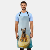 カヤックの上にフランスの立っている大人の茶色のブルドッグ エプロン (着用した状態)