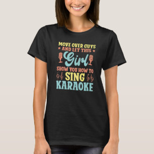 カラオケ歌手が男の子の上を移動し、この女の子をSh Tシャツ