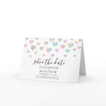 カラフルなハートの斑点がちりばちりと散るSave the Dateのデザイン招待状