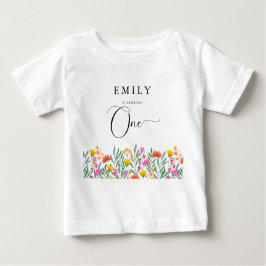 カラフルなワイルドフラワーの女の子の初めての誕生日 ベビーTシャツ