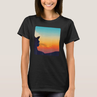 カラフルな夕日を眺める黒猫の子猫 Tシャツ