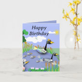 カラフルな漫画スタイルの池とガチョウ、ヒナ カード (黄色い花)