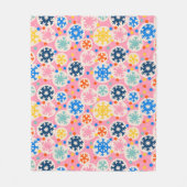 カラフルスノーフレークオンピンクホリデーパターン フリースブランケット (正面)