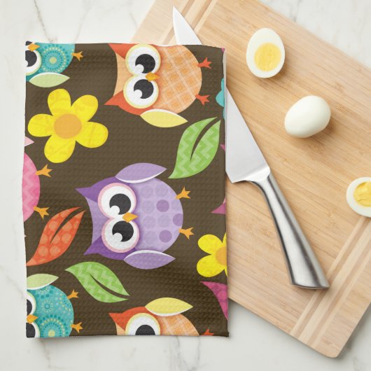 カラフルパターン(の模様が)ある輪と花 キッチンタオル (四つ折り)