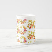 カラフルフローラ80番目の誕生日金ゴールド番号80パーティー ボーンチャイナマグカップ (正面)