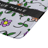 カラフル花、青い背景、黒 カッティングボード (角)