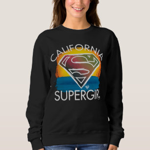 カリフォルニアのスーパーガールサンセットグラフィック スウェットシャツ