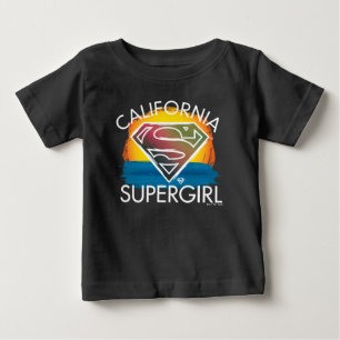 カリフォルニアのスーパーガールサンセットグラフィック ベビーTシャツ