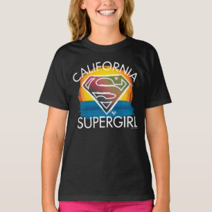カリフォルニアのスーパーガールサンセットグラフィック Tシャツ