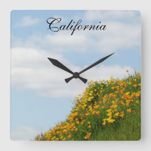 カリフォルニア時計のギフト ブルースカイの花畑 スクエア壁時計
