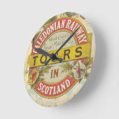 カレドニア鉄道。スコットランドのツアー。 ラウンド壁時計 (傾斜)