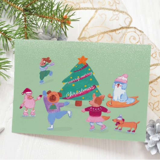 カワイドッグスアイススケートで滑るグリーンフラットホリデーカード シーズンカード
