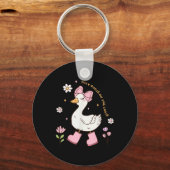 ガチョウ間抜けズオンザルーズコケット弓ピンクガールKi キーホルダー (正面)