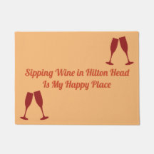 ガラスが付いているヒルトンヘッドのすするワイン