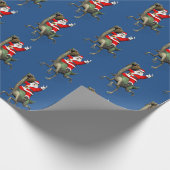 ガリミマス恐竜に乗るサンタクロース ラッピングペーパー (角)