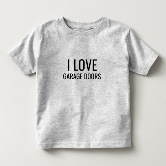 ガレージのドアが大好き 面白いクリスマスギフト トドラーTシャツ (正面)