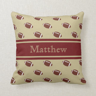 ガーネットおよび金ゴールドのフットボールの装飾用クッション クッション