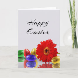 ガーベラが付いているカラフルなハッピーイースターの卵 シーズンカード