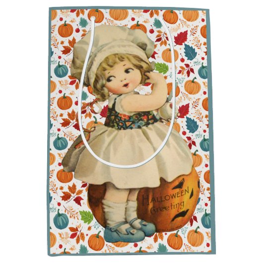 ガールカービングアップルとパンプキカラフルンハロウィーン ミディアムペーパーバッグ (正面)