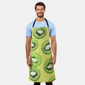 キウイフルーツのシームレスな模様、背景にキウイS エプロン (着用した状態)