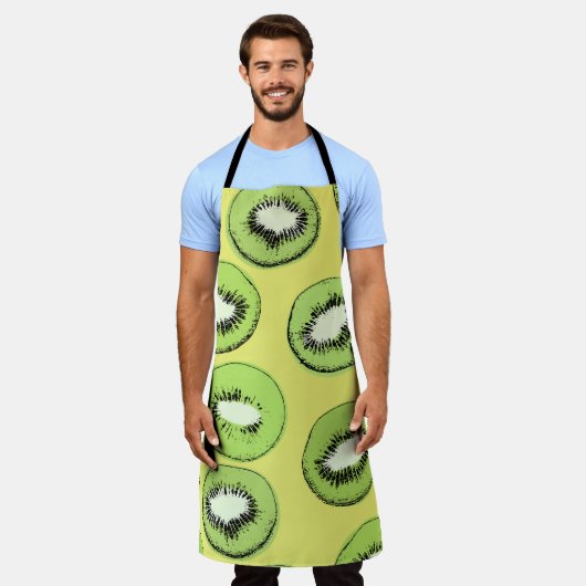 キウイフルーツのシームレスな模様、背景にキウイS エプロン (着用した状態)