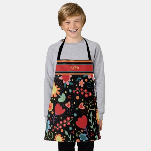 キッズカワイイフローラカラフルネーム料理 エプロン (着用した状態)