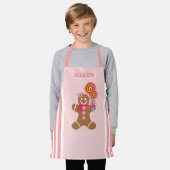 キッズキュートピンクジンジャーブレッドマンクリスマス エプロン (着用した状態)