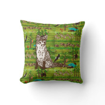 キツネが付いている木製のバッジの景色の枕