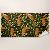 キツネとバターカップの黒 ビーチタオル (正面)