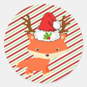 キツネの身に着けているトナカイのサンタの帽子の初めてのクリスマス ラウンドシール