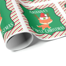 キツネの身に着けているトナカイのサンタの帽子の初めてのクリスマス