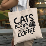 キャッツブックスコーヒータイポグラフィブックウォーム引用文 トートバッグ<br><div class="desc">タイポグラフィ引用文のトートバッグ。猫や本、コーヒーが好きな人に。誰が…しない？</div>