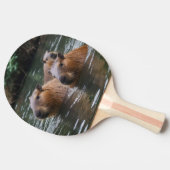 キャピバラスが川で泳いでいた。 卓球ラケット (横)