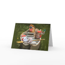 キャンおもしろいプカードにおもしろいを持つカヌーのリス