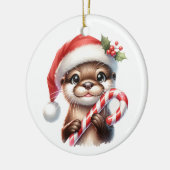 キャンディとサンタハットの愛らしいクリスマスオッター セラミックオーナメント (左)