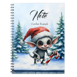 キャンディケインを持つふわふわクリスマスエルフ。 ノートブック