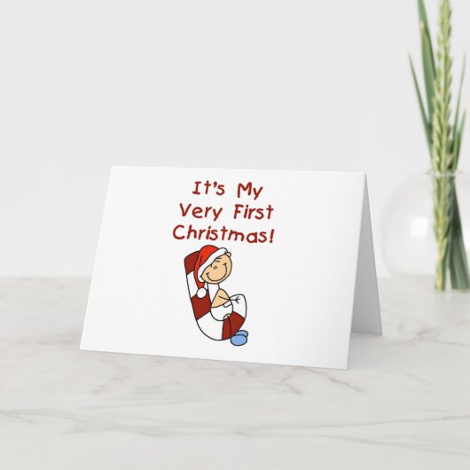 キャンディーの杖に横になった赤ちゃんの最初のクリスマス シーズンカード (正面)