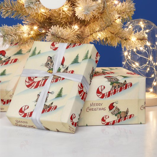 キャンディーケーンに乗ったクリスマスの子猫 ラッピングペーパー (クリスマス)