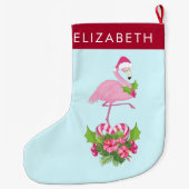 キャンディーケーンブーケとサンタハットのピンクのフラミンゴ ラージクリスマスストッキング (裏面)