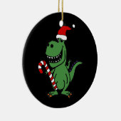 キャンディ・ケーンが付いているサンタの帽子のかわいいTレックスの恐竜 セラミックオーナメント (右)
