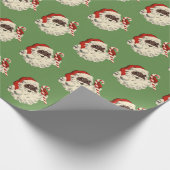 キャンディ・ケーンが付いているヴィンテージ黒いサンタ ラッピングペーパー (角)