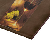 キャンドルライトによるワインそして緑のブドウのガラス カッティングボード (角)