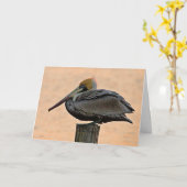 キャンバスの印刷を重ねて置く茶色のペリカン カード (黄色い花)