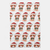 キャヴォードルドッグがクリスマススターを育てる キッチンタオル (縦)