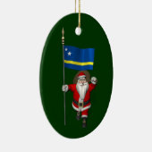 キュラソーの看板のあるサンタクロース セラミックオーナメント (右)