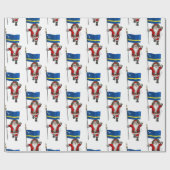 キュラソー州旗を持つサンタクロース ラッピングペーパー (フラット)