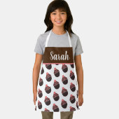 キュートなカップケーキチョコレートピンクふりかけピンク エプロン (インサイチュ)