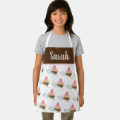 キュートなカップケーキ渦巻きチョコレートピンクウィスクスプレー エプロン (インサイチュ)